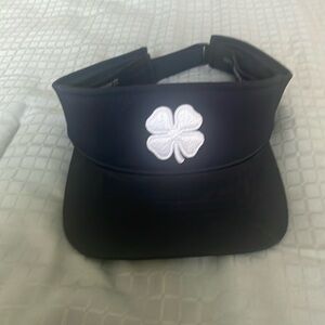 Black clover golf visor.